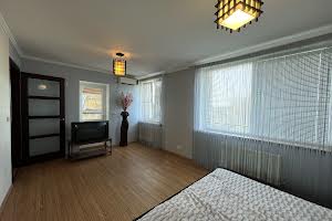 будинок за адресою Вулиця Леоніда Каденюка (Комарова), 80а