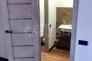 комерційна за адресою Костянтинівська вул., 75
