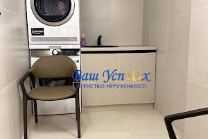 будинок за адресою Набережна вул., 77