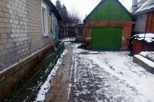 будинок за адресою Ґрунтовий проїзд (1-й Докучаєва)