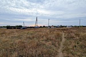 участок по адресу Комарова