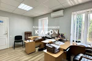 комерційна за адресою Олега Ольжича вул., 48А