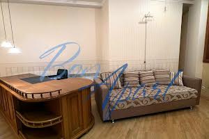 комерційна за адресою Євгена Коновальця вул. (Щорса), 36-Б