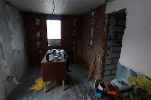 будинок за адресою Колійна вул. (Вороніна), 1