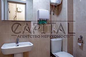 комерційна за адресою Лаврська вул. (Січневого Повстання), 4