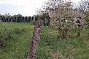 участок по адресу Мельниківська