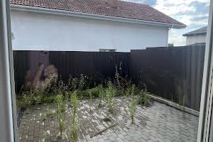 будинок за адресою с. Нові Петрівці, Канівська вул., 37а