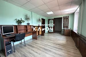 комерційна за адресою Олега Ольжича вул., 48А