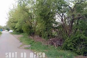 участок по адресу Мельниківська