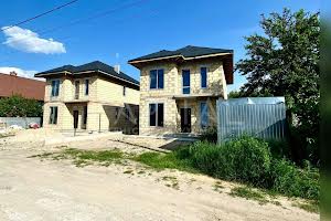 будинок за адресою Дмитра Русановича