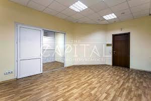 комерційна за адресою Євгена Коновальця вул. (Щорса), 32-Б