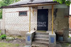будинок за адресою Порічкова вул. (Микити Ізотова), 22