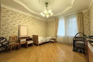 будинок за адресою Постишева вул., 1