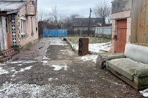 будинок за адресою смт. Мізоч, Якимчука, 58
