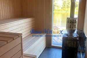 будинок за адресою Набережна вул., 77