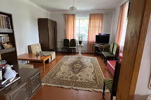 будинок за адресою Романа Шухевича вул.