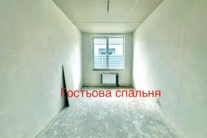 будинок за адресою с. Рожни, Пухівська