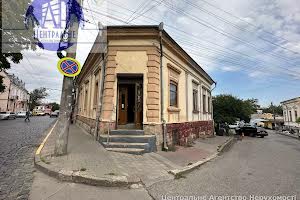 комерційна за адресою Йосипа Бурга вул. (Удонова), 1