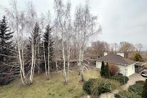 будинок за адресою Постишева вул., 1