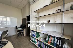 комерційна за адресою Олега Ольжича вул., 48