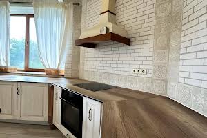 будинок за адресою смт. Обухівка, Дніпрова вулиця, 31 Б