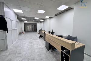 комерційна за адресою Подільська вул., 56