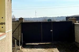 будинок за адресою с. Драгомирчани, Миру, 4
