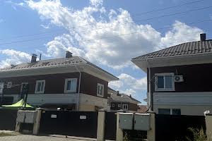 будинок за адресою с. Нові Петрівці, Канівська вул., 37а