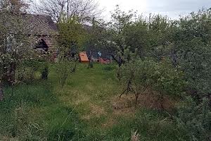 участок по адресу Мельниківська