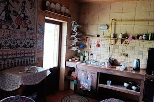 будинок за адресою с. Рокитне, загребля, 27