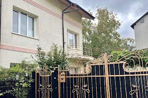 будинок за адресою Академіка Степана Рудницького вул.