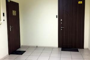 комерційна за адресою Євгена Коновальця вул. (Щорса), 32-Г
