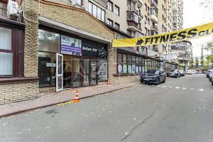 комерційна за адресою Євгена Коновальця вул. (Щорса), 32-Б
