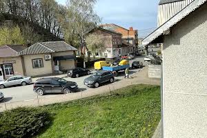дом по адресу Коновальця