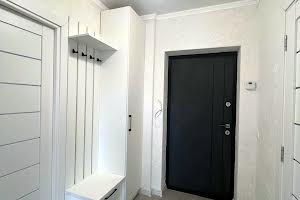 квартира за адресою Коновальця, 35