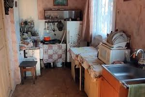 дом по адресу Пожарницького