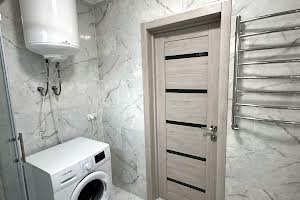 квартира за адресою Кобринської Н., 13