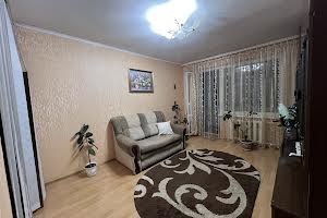 квартира за адресою Тополина вул., 26