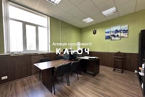 комерційна за адресою Олега Ольжича вул., 48