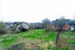 участок по адресу Космическая ул., 1