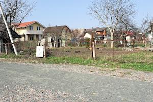 участок по адресу Садовая ул.