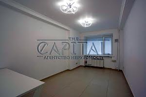 комерційна за адресою Лаврська вул. (Січневого Повстання), 4