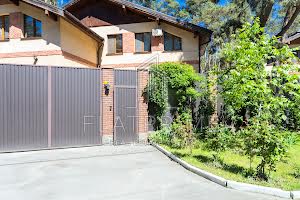 будинок за адресою с. Плюти, Київська, 24В