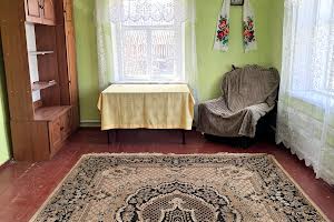 будинок за адресою с. Комарин, Чапаєва, 148