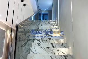 будинок за адресою Набережна вул., 77