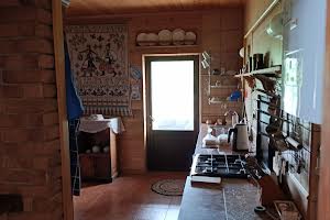 будинок за адресою с. Рокитне, загребля, 27