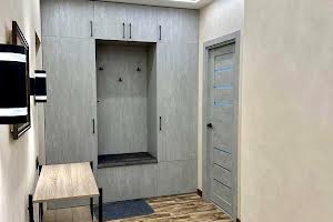 квартира за адресою смт. Слобожанське, Сімейна вул., 5