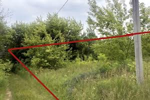 участок по адресу Комарова