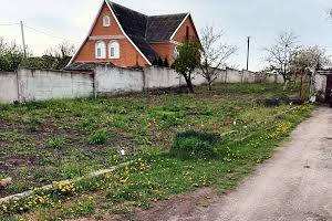 ділянка за адресою смт. Обухівка, Тітова, 13а