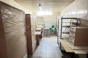 будинок за адресою Небесної Сотні вул. (Паризької Комуни), 57А